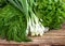 Fresh greens on wooden background