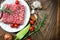 Fresh ground beef meat with seasonings - minced beef on plate