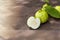 Fresh guava fruit on wood table with sun ray. Fresh guava slide