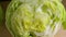 Fresh halved iceberg lettuce close up