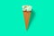 fresh hami melon and oats flavor ice cream cone with a bite on green background