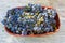 Fresh harvested blue grapes ceramic bowl vintage wood backgrounds