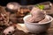 Fresh hazelnut ice cream on wooden table.