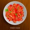 Fresh and Healthy Tomato Salad on wooden background