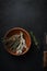 Fresh herbs still life on dark background, top view