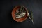 Fresh herbs still life on dark background, top view