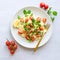 Fresh home-made tabouli, or tabbouleh salad, top view on grey concrete background