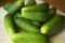 Fresh homemade cucumbers, small gherkins from the garden on the table