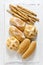 fresh homemade Italian bread: ciabatta, wholemeal, turtle, gressini. breadsticks with sesame seeds