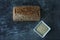 Fresh homemade rectangular bread on a dark background. Mother dough bread. Homemade bread sourdough, rustic baked bread.