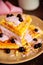 Fresh homemade Viennese waffles, drenched with yogurt and berries