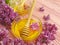 Fresh honey lilac flower on wooden background