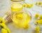 Fresh honey, yellow aroma summer  aromatherapy cure chrysanthemum flower on concrete background