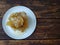 Fresh honeycombs on a plate on a table