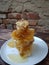 Fresh honeycombs on a plate on a table