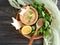 Fresh hummus, greens ingredient on a wooden background cuisine
