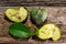 Fresh hybrid fruit of atemoia Annona cherimolia Mill x Annona squamosa L. in matedes on wooden background