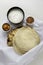 Fresh Indian flat breads Naans and poppadums served on the white cloth