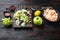 Fresh ingredients for tasty Waldorf prawn salad, with sauce apple and grape, on old dark  wooden table , with copy space for text