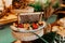 Fresh, inviting tabletop display of an assortment of foods, consisting of a honey and strawberries