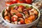 Fresh Italian panzanella salad close-up on the table. horizontal