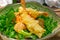 Fresh Japanese tempura shrimps with salad