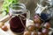 Fresh and juice grapes on wooden table