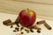 Fresh juicy Apple with cinnamon on wooden Board with raisins organic vegetarian on wooden background