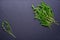 Fresh juicy arugula on a black background