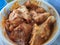 Fresh and juicy chicken with spice ingredients and secret recipes in basin or \\\'Ayam Perap\\\' in Malay