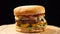Fresh juicy hamburger rotating on black background.