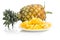 Fresh juicy nutritious cut pineapple with whole fruit as backgro