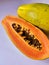 Fresh and juicy papaya, cut in half papaya, tasty and full of vitamins fruit, papaya seeds