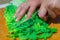 Fresh and juicy Peking cabbage or Chinese cabbage leaves are chopped on a cutting board. Close-up