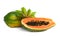 Fresh juicy ripe papayas with leaf on white