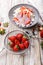 Fresh juicy ripe strawberries and farmers delicious cottage cheese with ripe fruit pieces. Organic food on your table. Delicious