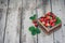 Fresh juicy strawberries with leaves. Rustic wooden box and handmade lace. Retro magazine picture. Strawberry with copy space