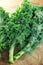 Fresh kale on cutting board