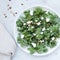 Fresh kale salad with goat cheese, pine nuts and sweet balsamic vinegar dressing