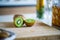 Fresh kiwifruit on wooden cutting board.