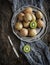 Fresh kiwis on vintage plate