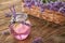 Fresh lavender lemonade in glass jar on wooden table