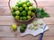 Fresh lemon both green and yellow together in a basket, lemon s