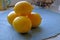 Fresh lemon bunch on a blue background landscape