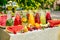 Fresh lemonade collection watermelon, orange, lemon, strawberry and berry in the street, on a wooden table with fruit