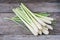 Fresh lemongrass (citronella) on wooden background - Spice for h