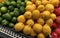 Fresh lime and lemon fruits at the fresh produce section of a market