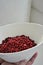 Fresh lingon berries or Cowberries in a white porcelain bowl: These berries are nutritious and vitamin rich