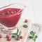 Fresh Lingonberry sauce in a gravy boat closeup