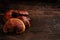 Fresh Lingzhi mushroom on dark wooden floor.